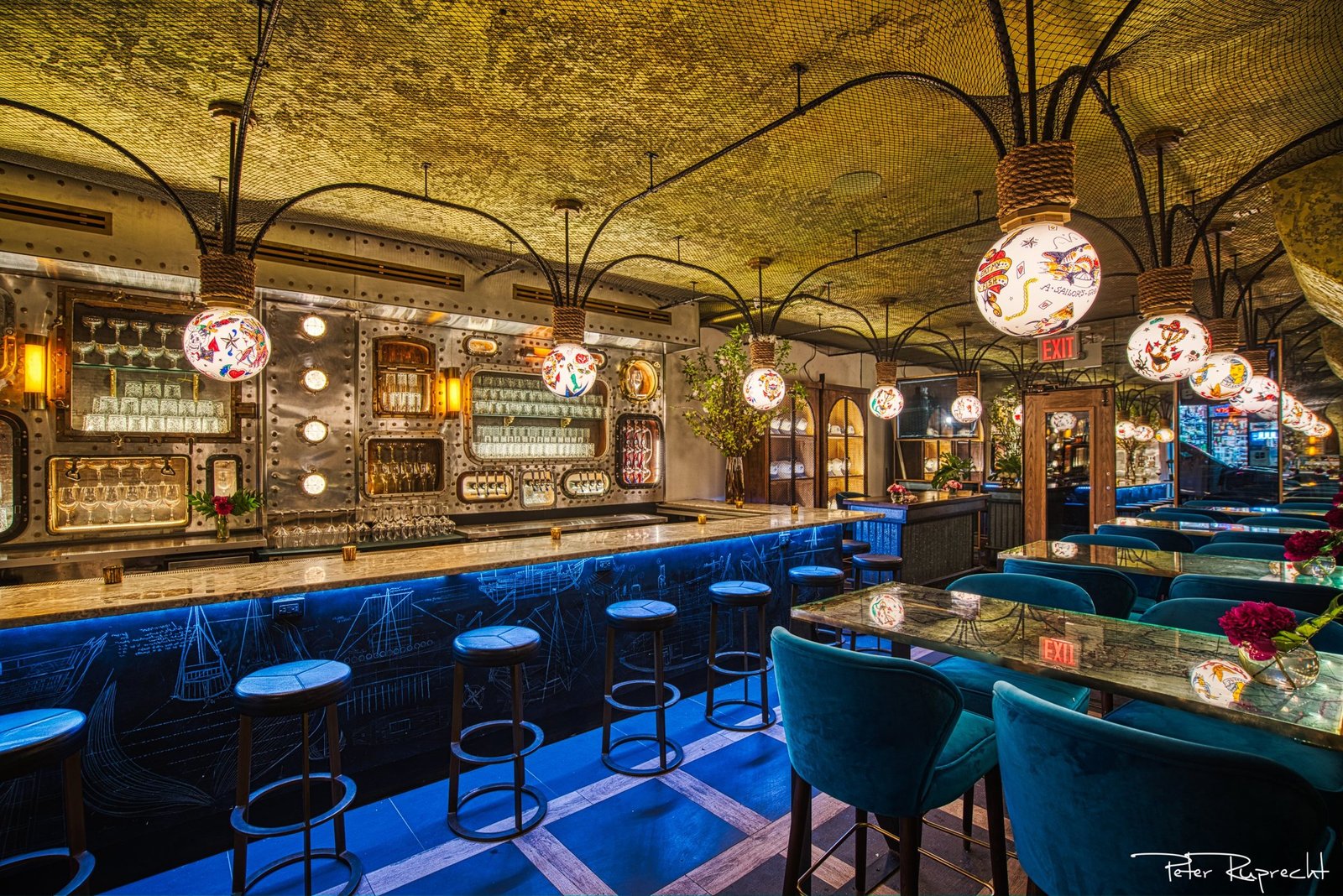 The ship's bar with porthole shelving and globe lanterns
